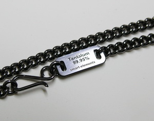 Polished tantalum identification tag